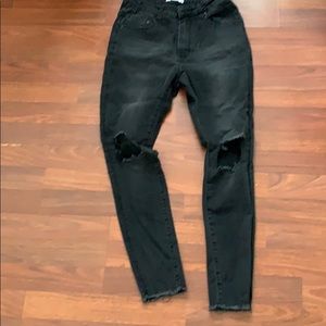 Black distressed skinny jeans